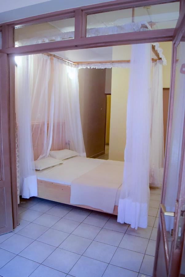 Botanika Hotel Buyumbura Exterior foto